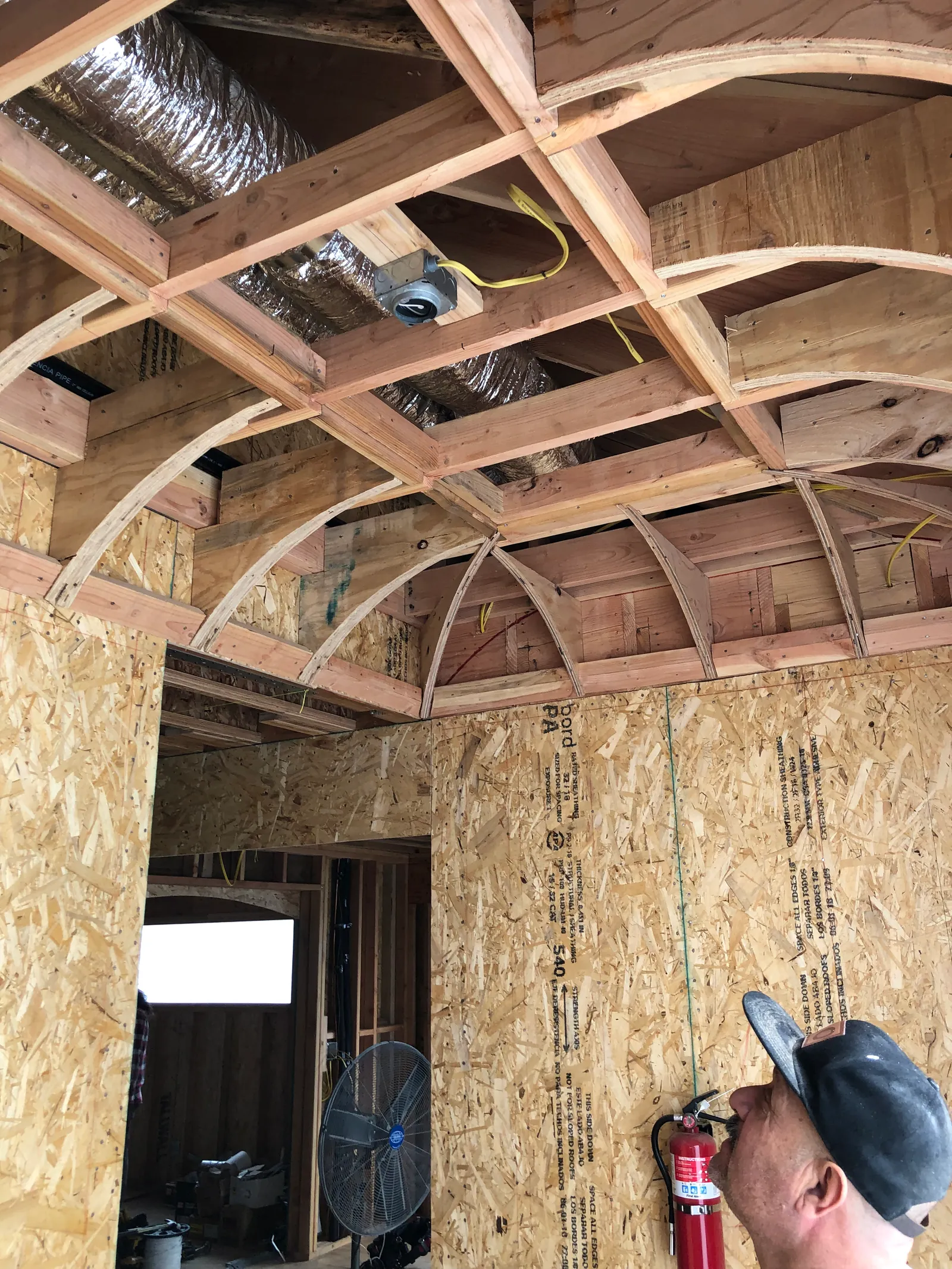 Drywall hung on a barrel-vaulted ceiling